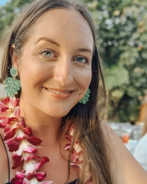 Tera of Penelli Creative Marketing, smiling outdoors